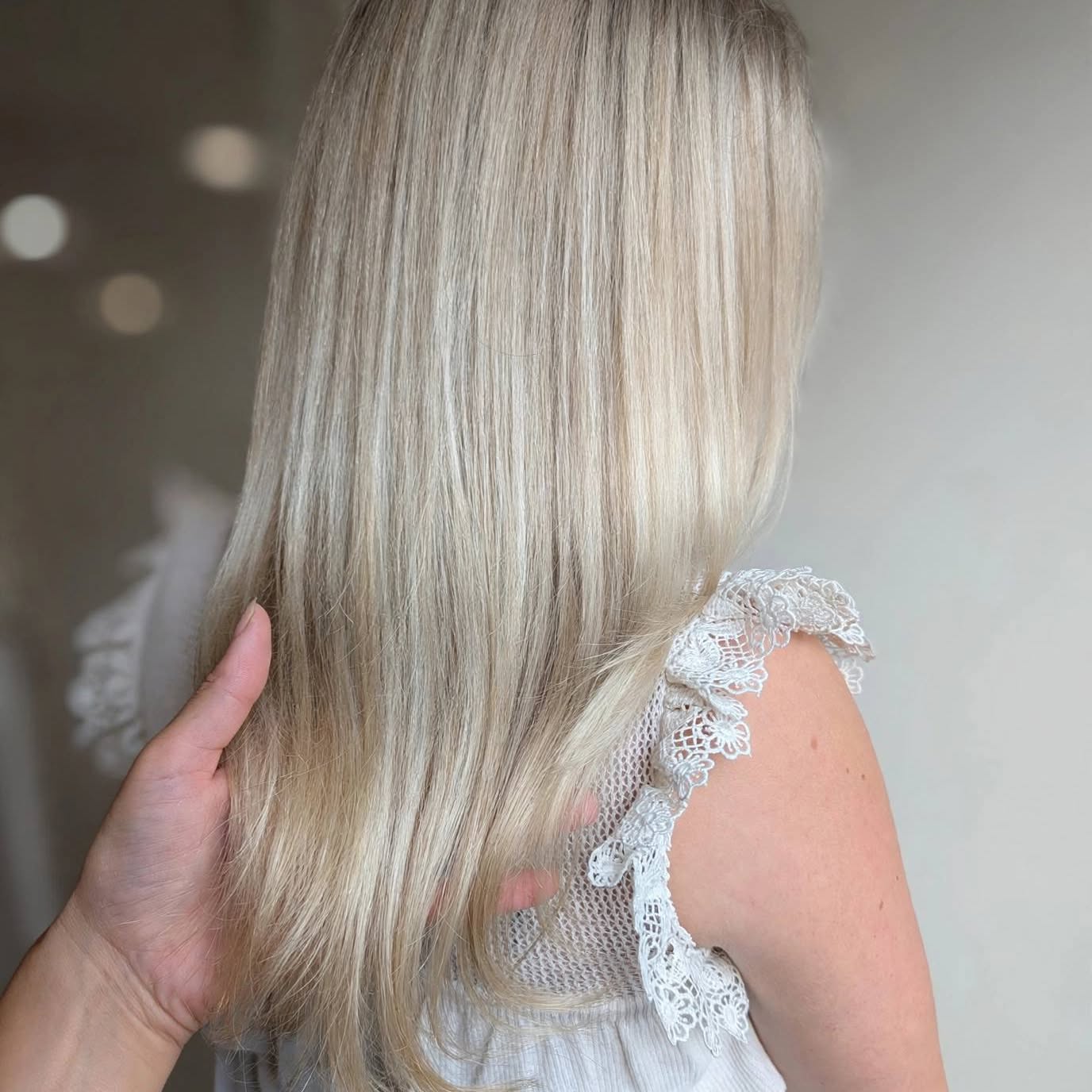 Lang lichtblond haar met fijne highlights